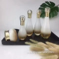 Wholesales high-grade Bowling shape Gradient golden cosmetics electroplating glass bottle/jars with good price